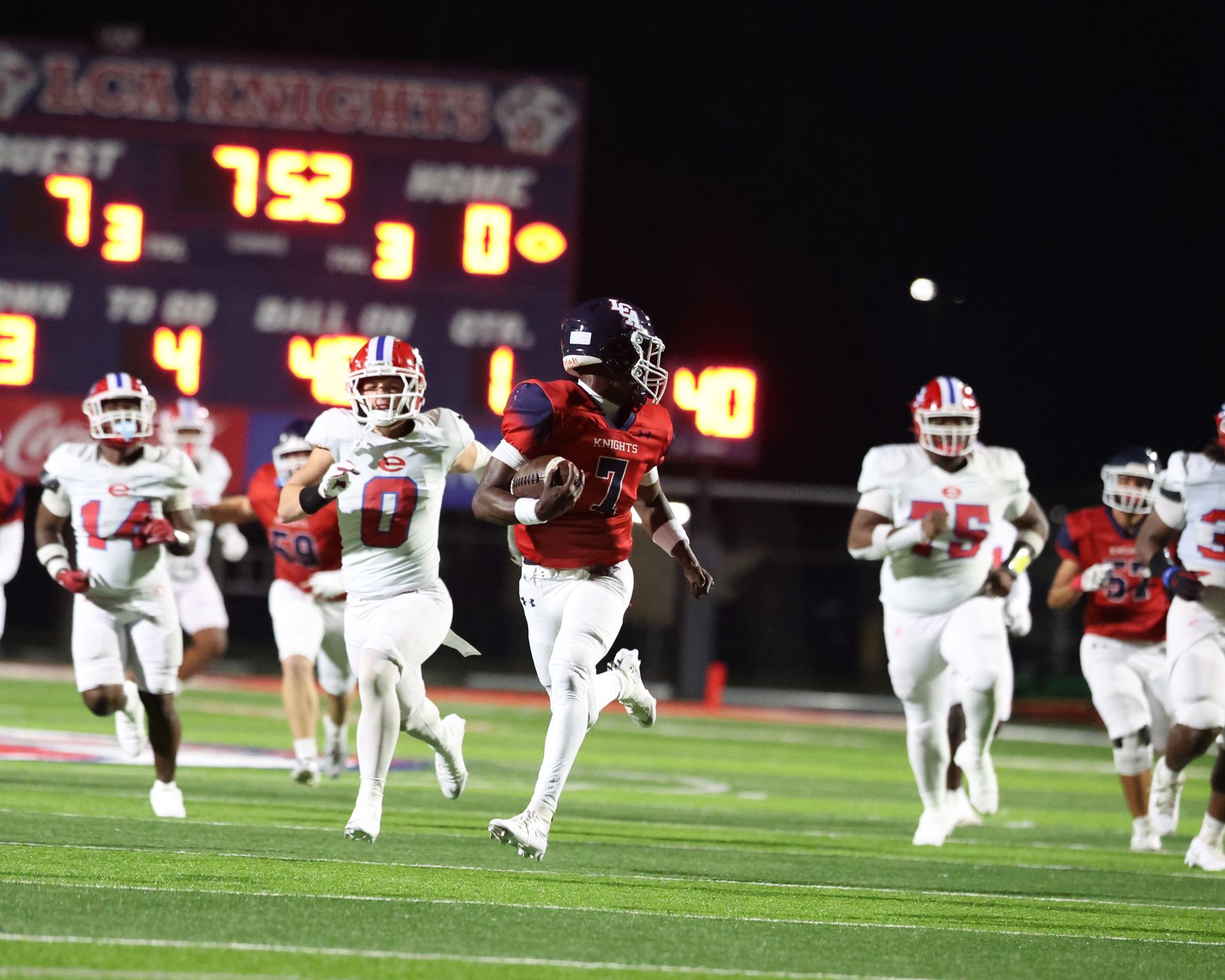 Knight breaking free under the scoreboard